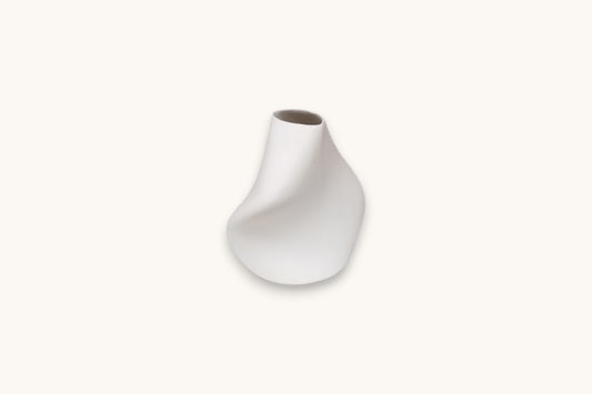 White ceramic vase on a white background